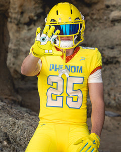 Phenom Elite SpongeBob football gloves lifestyle photo — yellow SpongeBob VPS5 Vapor-Stick gloves in action