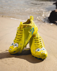 Phenom Elite SpongeBob football cleat lifestyle photo — close-up on field