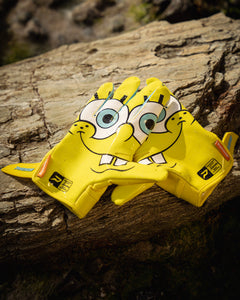 Phenom Elite SpongeBob football gloves lifestyle photo — yellow SpongeBob VPS5 Vapor-Stick gloves on field