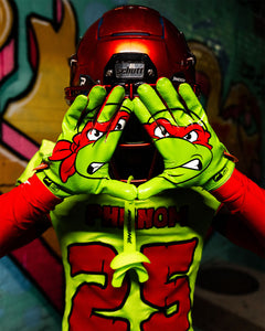 Phenom Elite TMNT Raphael football gloves lifestyle photo — green Vapor-Stick gloves player shot