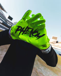 Phenom Elite x Rick and Morty VPS1 Vapor-Stick football gloves — lifestyle photo on field with Rick and Morty character art