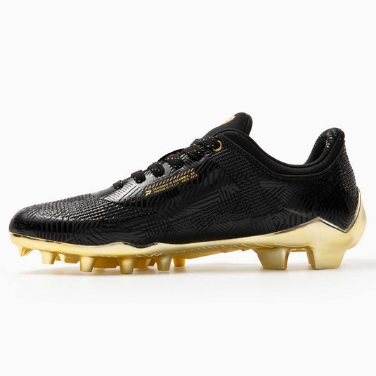 Phenom Elite Quantum Carbon Gold Rush Black & Gold football cleat — close-up of black upper and gold accents