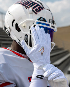 Phenom Elite Quantum Fierce white padded football gloves on-field