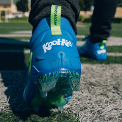 Phenom Elite Kool-Aid Bluedini football cleat lifestyle photo — cleats with packet 2