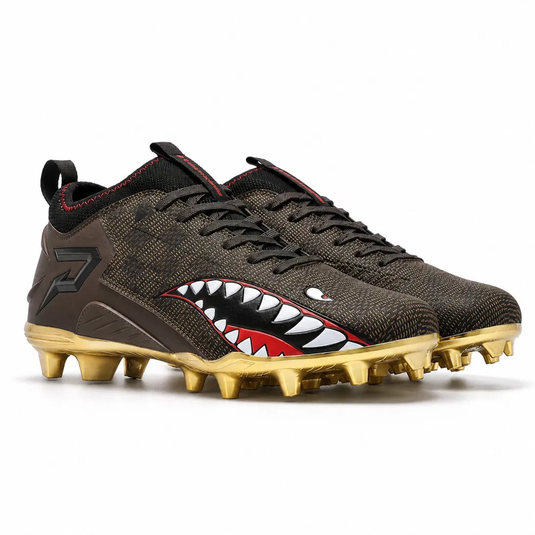 Phenom Elite Luxury Warhawk low-cut speed football cleat — brown and gold luxury colorway with metallic gold outsole and red shark-teeth, side view of both shoes