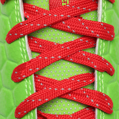 Phenom Elite Raphael football cleat — close-up of laces and red-mask detailing