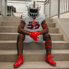 Phenom Elite Quantum Speed 2.0 red football cleat — on-field