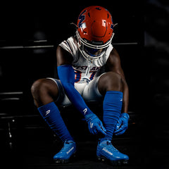 Phenom Elite Quantum Speed 2.0 royal blue football cleat — on-field