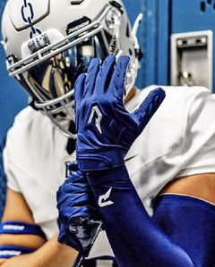 Phenom Elite Quantum Fierce navy blue padded football gloves lifestyle