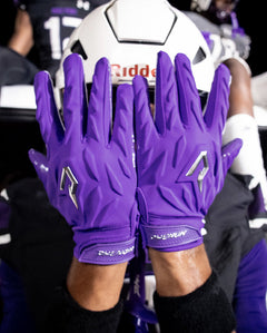 Phenom Elite Quantum Fierce purple padded football gloves lifestyle