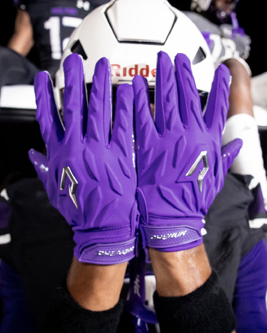 Phenom Elite Quantum Fierce purple padded football gloves lifestyle
