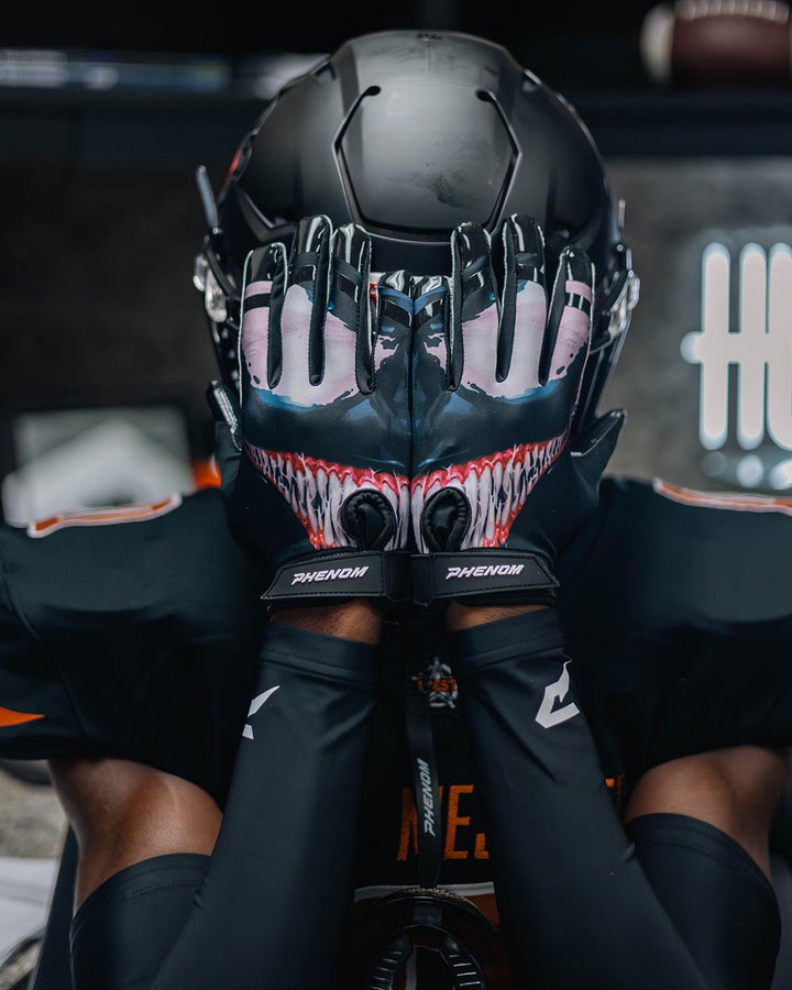 football helmet and gloves Phenom Elite Villain Football Gloves