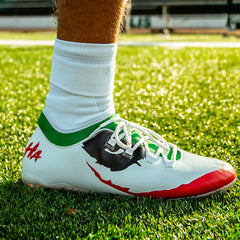 Phenom Elite Joker youth football cleat — page builder lifestyle shot
