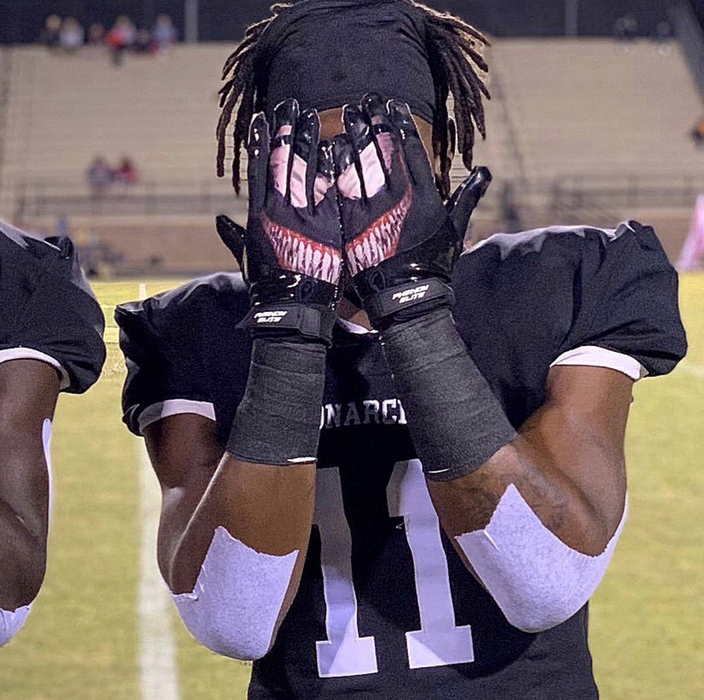 Black and purple football top gloves